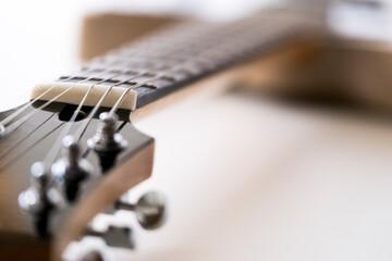 Fototapeta na wymiar Close up of guitar neck and strings