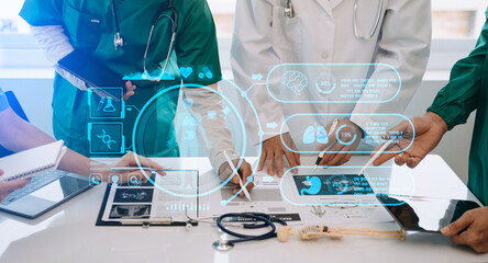 Medical technology network team meeting concept. Doctor hand working with smart phone modern digital tablet and laptop computer with graphics chart interface, with virtual icon .