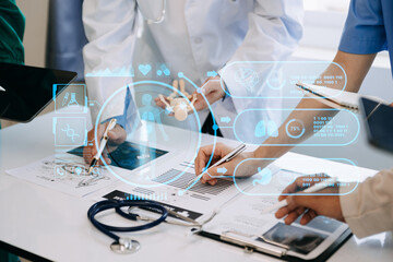 Medical technology network team meeting concept. Doctor hand working with smart phone modern digital tablet and laptop computer with graphics chart interface, with virtual icon .