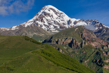 Fototapeta premium Kazbek or Kazbegi mountain,near the Gergeti Trinity Church ,Stepantsminda village in Georgia ,At an altitude of 2170 meters, 
