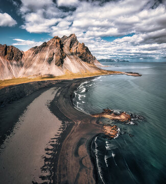 Vestrahorn mountain with black sand beach in Stokksnes peninsula at Iceland