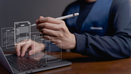 business manager uses digital technology to control online document storage data processing. software and quality of electronic files. the virtual folder checks and ticks reports in the database.