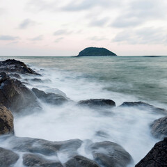 Sunset on the rocky shore.