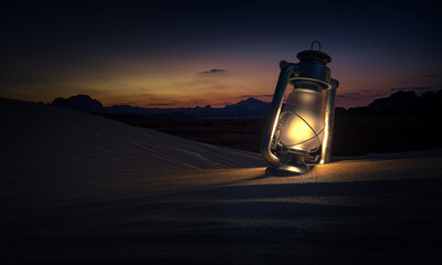 oil lamp in the sand on the desert dunes