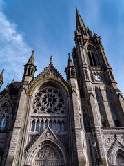 Fototapeta premium Catholic Cathedral in Ireland, Gothic style. The Cathedral Church of St Colman known as Cobh Cathedral, or Queenstown Cathedral, single-spire cathedral in Cobh, Ireland.