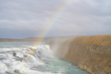 waterfall Gull-Foss(Golden falls) Iceland. beautiful rainbow above Gull Foss waterfall.