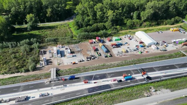This aerial drone video shows an highway which is being build in the Netherlands. The highway connects the A4 with the A44 near Leiden.