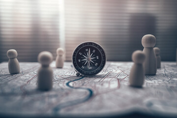 Compass and The wooden doll represents the employee of the company on route map represents...
