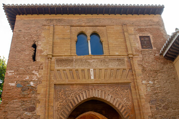 Architectural details of the Alhambra fortified palace complex and Granada city