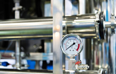 Close up of manometer on hydraulic equipment