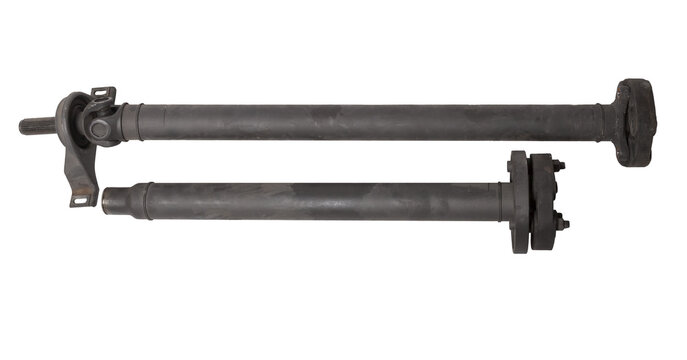 propeller shaft of a car with a steel rod, a sliding fork and an intermediate bearing for transmitting torque. Spare part for sale or replacement in a auto service.