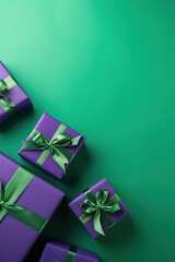 Green and purple christmas gift boxes on green background