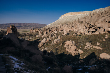 Cave town and rock formations in Zelve Valley, Cappadocia, Turkey - feb 2023