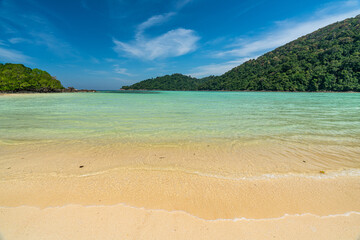 Fototapeta na wymiar Tranquil Mai Ngam beach in beautiful day, Surin island national park, Phang Nga, Thailand,