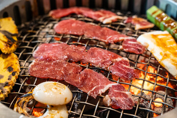 Yakinuku Japanese babecue grill - wagyu beef with vegetable on charcoal grill