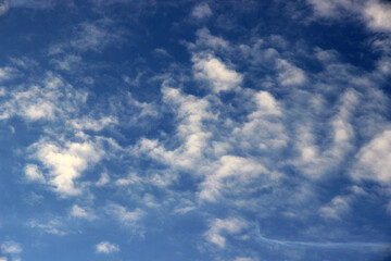 Beautiful blue sky with clouds background.
