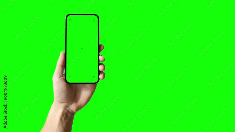 Poster a set with a phone in hand with a green screen and tracking markers, along with a hand tapping a dis