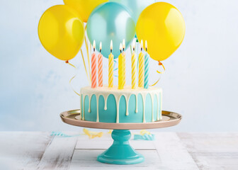 Birthday cake with drip icing and party balloons