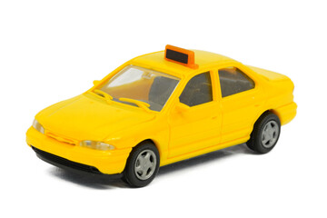 yellow toy car isolated on white