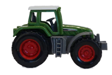 Gordijnen green toy tractor isolated on white © Jakob