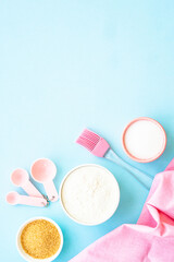 Food baking background. Ingredients for cooking at blue. Flat lay.