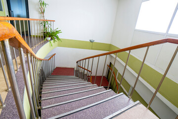 A fragment of the interior with a staircase to the second floor in a residential building