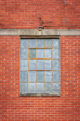 Fototapeta na wymiar Old Factory Window and Wall