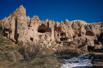 Cave town and rock formations in Zelve Valley, Cappadocia, Turkey - feb 2023