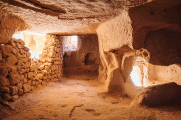 Cave town and rock formations in Zelve Valley, Cappadocia, Turkey - feb 2023 - obrazy, fototapety, plakaty