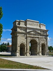 Fototapeta na wymiar Orange, May 2023 : Visit the beautiful city of Orangeen Provence - Historical city with its arena and ancient theater - View on the triumphal arch