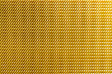 Background texture and pattern of section voshchina of wax honeycomb from a bee hive for filled...
