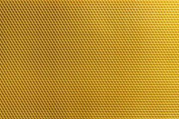 Photo sur Plexiglas Abeille Background texture and pattern of section voshchina of wax honeycomb from a bee hive for filled with honey. Voshchina an artificial basis for the construction of honeycombs, sheet of wax of cells
