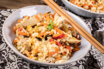 Fried chicken with rice and vegetables.