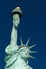 Close-up of the crown, the arm, and the torch of the Statue of Liberty, New York