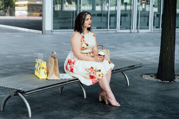 Self-Confidence, Preparing for Success. Outdoor portrait of beautiful successful and confident plus...