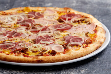 tasty pizza on the wooden background