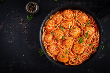 Spaghetti pasta with meatballs in tomato sauce. Italian pasta. Top view, flat lay