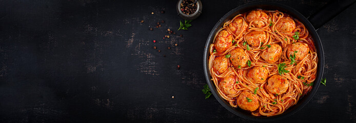 Spaghetti pasta with meatballs in tomato sauce. Italian pasta. Top view, flat lay