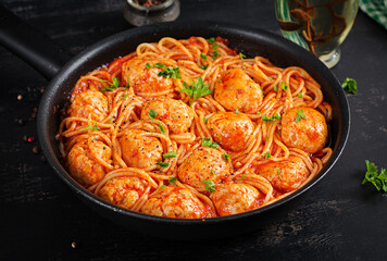 Spaghetti pasta with meatballs in tomato sauce. Italian pasta.