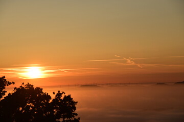 sunset over the clouds