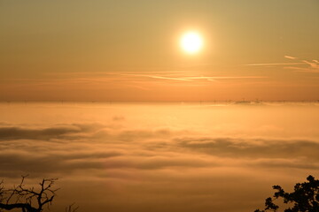 sunset on the clouds