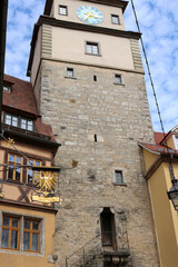 Fototapeta na wymiar Stone Clocktower in Germany