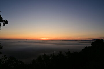 sunset over the clouds