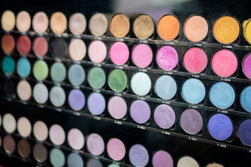 Vibrant professional eyeshadow for make up - close up view. Makeup, beauty, fashion and glamour concept