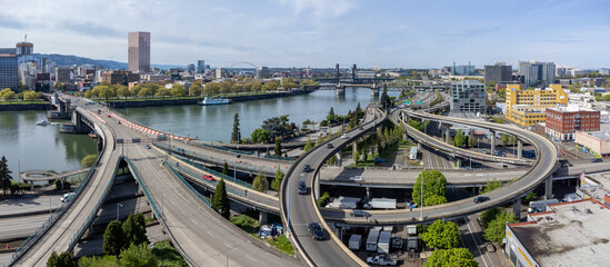 Highways, bridges, buildings and the Willamette River create this scenic aerial view of Portland,...