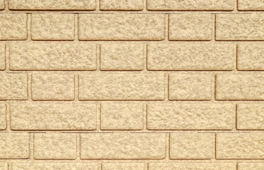 Fototapeta premium Plastic flexible modern finishing material. Brick decorative wall close-up.