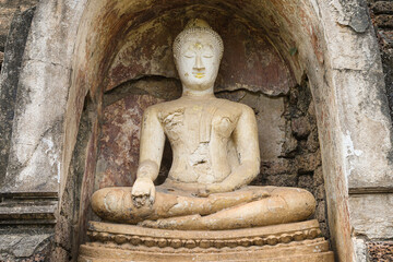 Seated Buddha at Wat Chang Lom in Si Satchanalai