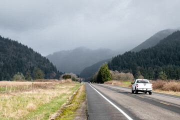 Highway Stretching Through Countryside of Tillamook, Oregon on Foggy Day