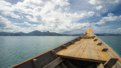 View from the wooden boat to stunning Khao Sok National Park in Thailand