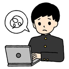 パソコン学習をする男子中学生が困惑している